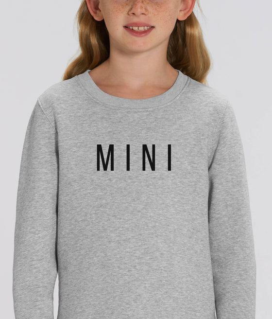 Mini slogan organic cotton Kid's sweaters in neutral colours white and grey. Available with matching MAMA sweater women. A lovely eco gift for Mother's Day. Shop sustainable and ethical fashion.